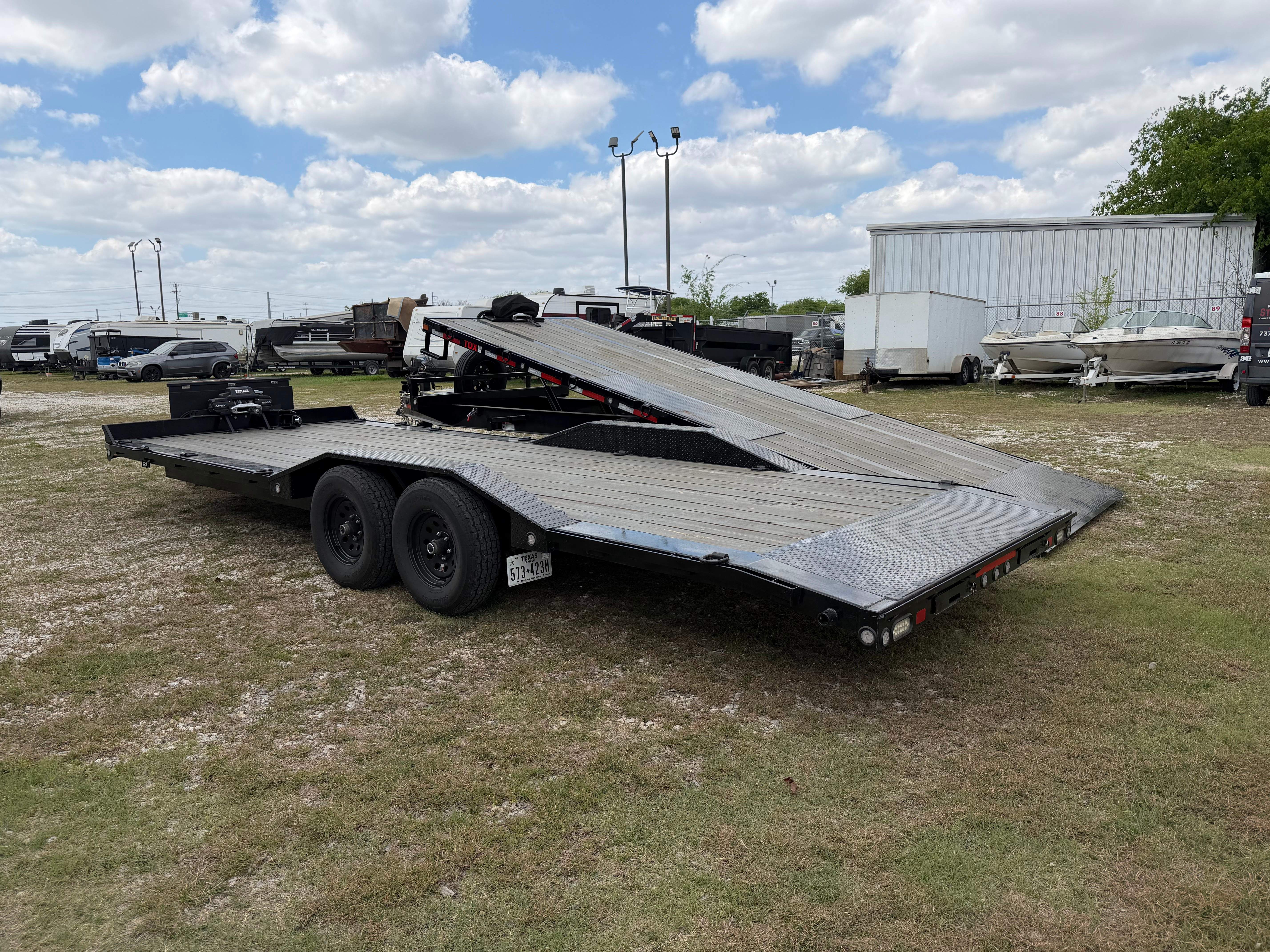 Maxx-D H5X car hauler with tilt deck raised for loading in Leander TX
