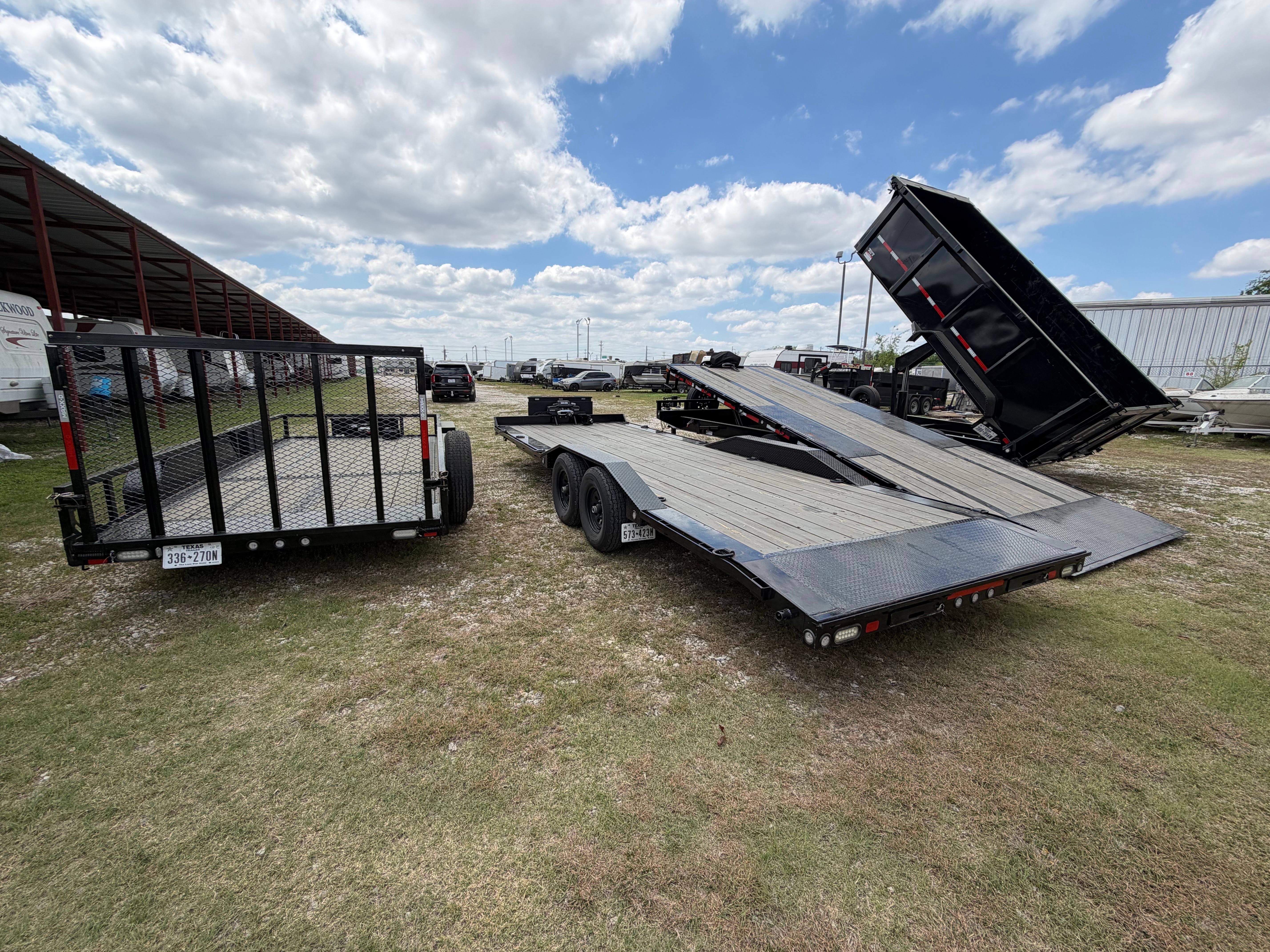 Chapman fleet overview showing dump, deckover and utility trailers